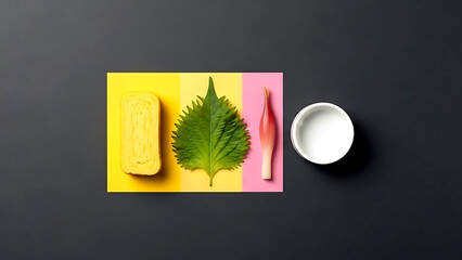 Overhead flat lay, Japanese color study a single piece of yellow tamago, a green shiso leaf, a pink pickled ginger slice, and a white ceramic soy dish 