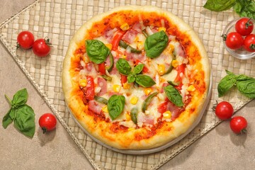 Delicious homemade Margherita pizza and ingredients
