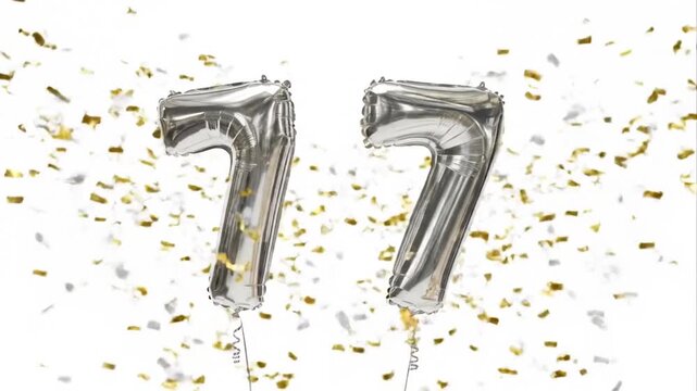 Silver number 77 balloons with confetti on white background