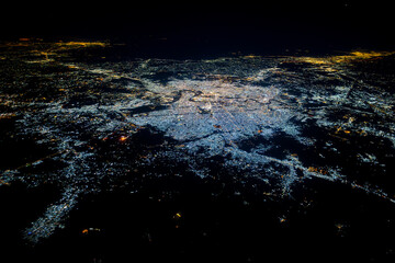 Aerial view of Baghdad city at night with Tigris river meanders, Iraq