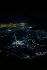 Aerial view of Baghdad city at night with Tigris river meanders, Iraq