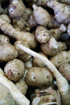 Topinambour and parsley roots at weekly market in Wolfratshausen Germany
