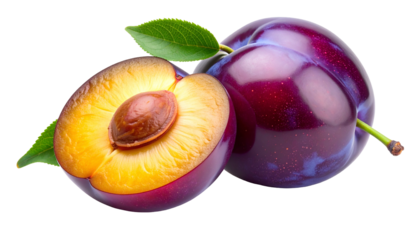 Isolated ripe plums one whole, one halved, revealing seed & flesh. Green leaves accent