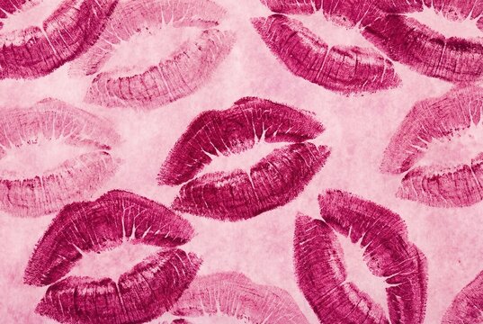Pink lipstick kiss marks pattern background for valentine aesthetic wallpaper
