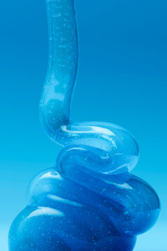 Blue liquid sculpture in 3D with fluid motion and bubbles