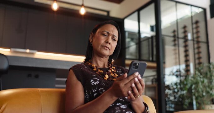 Confused, reading or woman with phone on sofa, check notification or phishing email for insurance scam. Below, suspicious message or mature person worried in home, personal info request or mobile