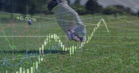 Holding female golfer's white gloved hand placing ball on golf tee, with candlestick charts +6