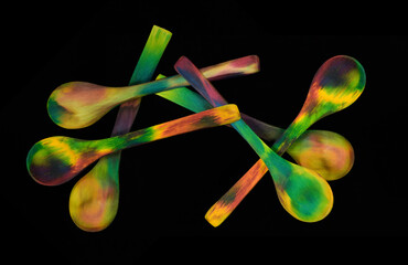 Colourful hand dyed wooden spoons dyed with food colouring. Wooden spoons natural materials and environmentally safe unlike plastic spoons sustainable materials and eco friendly food utensils