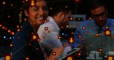 Animation of network of connections with icons over business people - Powered by Adobe