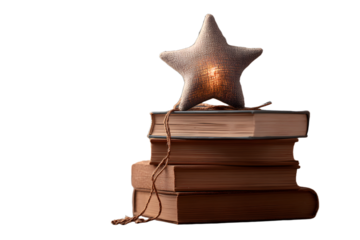 a star is sitting on top of a stack of books