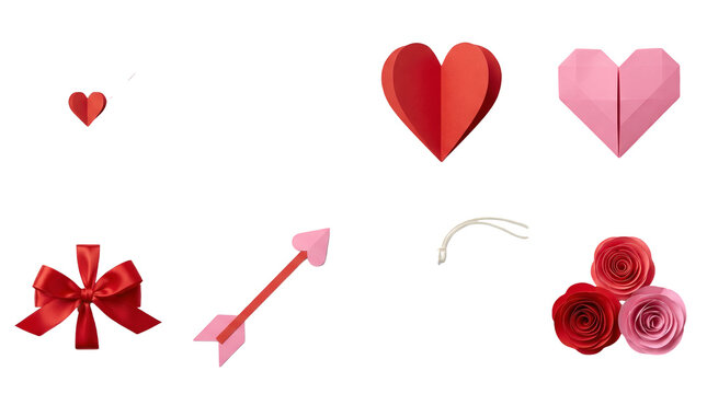 Valentine's Day paper craft set including envelope, heart origami, gift box, arrow, tag, and rose elements. Romantic flat lay collection for love and anniversary designs.