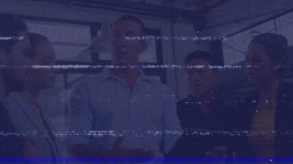 Animation of binary coding over diverse football players on beach - Powered by Adobe