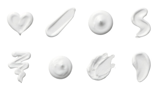 White cosmetic cream set including heart, swirl, drop, smear, and zigzag textures isolated. Skincare and beauty product collection.