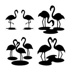 Obraz premium Collection of elegant black flamingo silhouettes depicting various poses and groupings in tropical settings