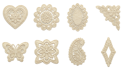 Cream lace embroidery set including heart, floral, butterfly, paisley, and scroll patches isolated. Vintage craft and sewing collection.