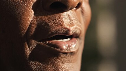 Close Up of a Person's Mouth and Lips Mid-Sentence with Subtle Skin Texture and Soft Natural Lighting