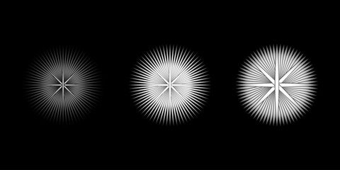 A collection of three radial light ray designs on a black background