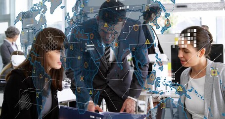 Colleagues leaning over desk examining documents initiating world map overlay for business analysis - Powered by Adobe