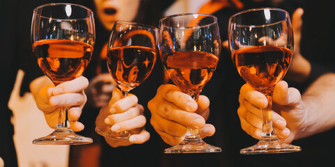 Friends enjoying a Halloween party at a bar making a toast