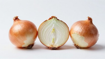 Whole and sliced yellow onions on white background