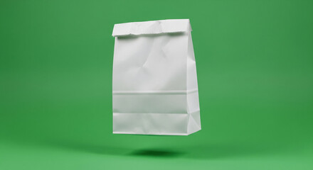 A white paper bag floats against a vivid green background