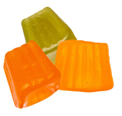 close-up of a refreshing selection of assorted fruit jellies and candies, including vibrant green, orange, and pink cubes, presented in a clustered arrangement on a dark background.