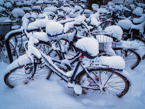bike covered with big thick snow layer after blizzard