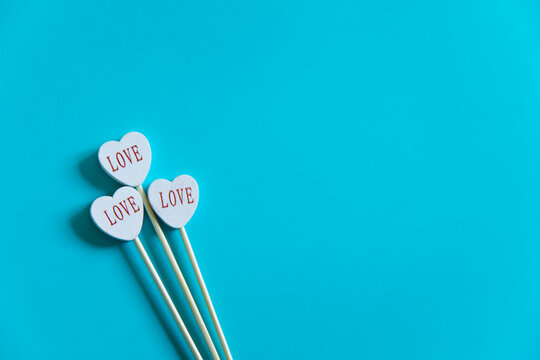 Heart-shaped love decoration on blue background for valentines day