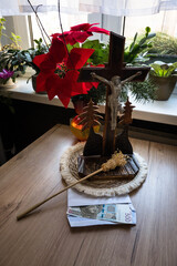Home altar prepared for the priest's visit after Christmas carols. Donation for the church in an envelope.
