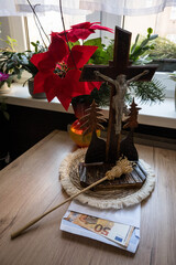 Home altar prepared for the priest's visit after Christmas carols. Donation for the church in an envelope.
