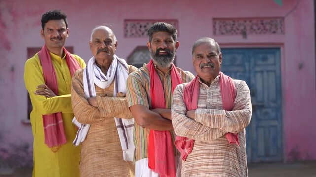 indian farmers standing confidently 