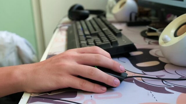 close-up of a hands typing on a computer