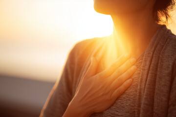 Emotional healing inner peace awellness journey concept. A warm, glowing light emanates from a person's chest in comfort
