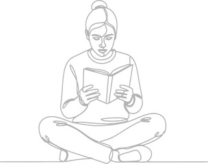 Woman sitting cross legged reading a book