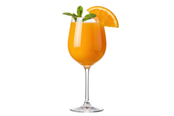 fresh orange juice in a wine glass with mint leaves and an orange slice garnish isolated cutout