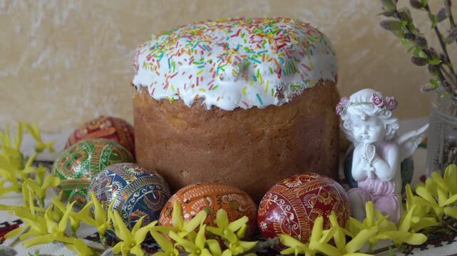 festive Easter composition easter bread pysanky and angel, Paska, pysanky and angel in festive decoration