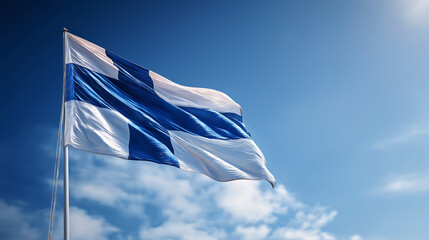 Finnish national flag waving gracefully in the wind against a clear blue sky. The image represents independence, patriotism, national pride, freedom, unity, Nordic culture, Scandinavian identity,