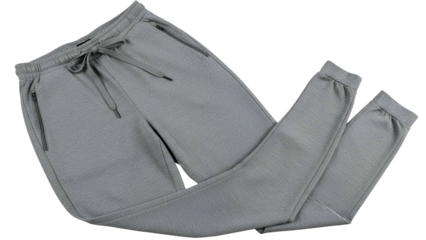 Overhead shot of gray athletic pants with a drawstring waist and zipped pockets on black background