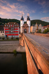 Heidelberg, Germany. Cityscape image of historical city of Heidelberg, Germany with Old Bridge Gate at autumn sunrise.