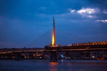 Hali&ccedil; Bridge at night. Golden Horn Bay.