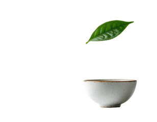A single, vibrant green tea leaf floats above a speckled, light-colored ceramic teabowl.