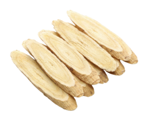 A small pile of diagonally sliced, dried astragalus root. The light-colored, oval slices show a woody, fibrous texture.