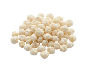A pile of small, white, puffed cereal balls with a textured, lumpy, and porous surface.