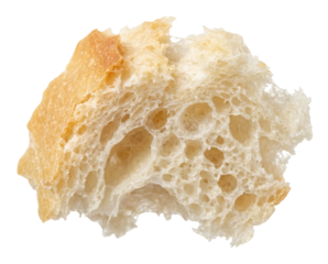 A close-up of a torn piece of fresh bread, showing its golden crust and an airy, porous crumb structure.