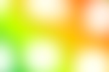 Abstract blurred background image of green, yellow, orange colors gradient used as an illustration. Designing for posters, interior, banner, card or advertisements.