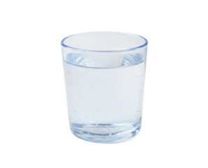 A simple, clear tumbler filled with fresh, bubbly water, embodying purity and refreshment.