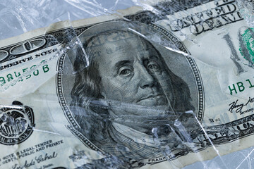 One Hundred Dollar Bill Frozen in Ice