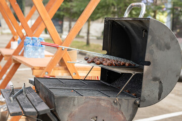 Chestnuts are roasted in an open air oven.