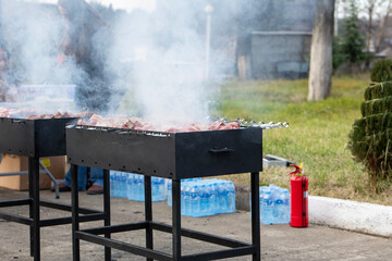B-B-Q. Grilling meat on skewers on the street