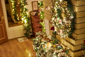 Cozy Christmas interior with festive garland lights and beautifully decorated holiday wreath on a brick fireplace. Warm home atmosphere, holiday spirit, winter celebration and family comfort